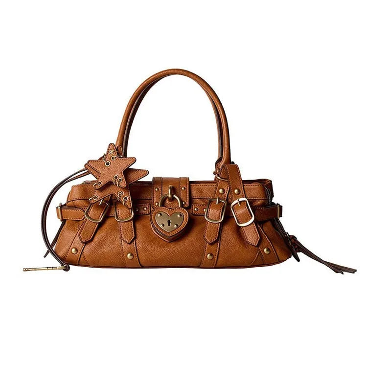 Brown microfiber synthetic leather handbag featuring rivets, a heart-shaped lock, and a star-shaped decorative charm.