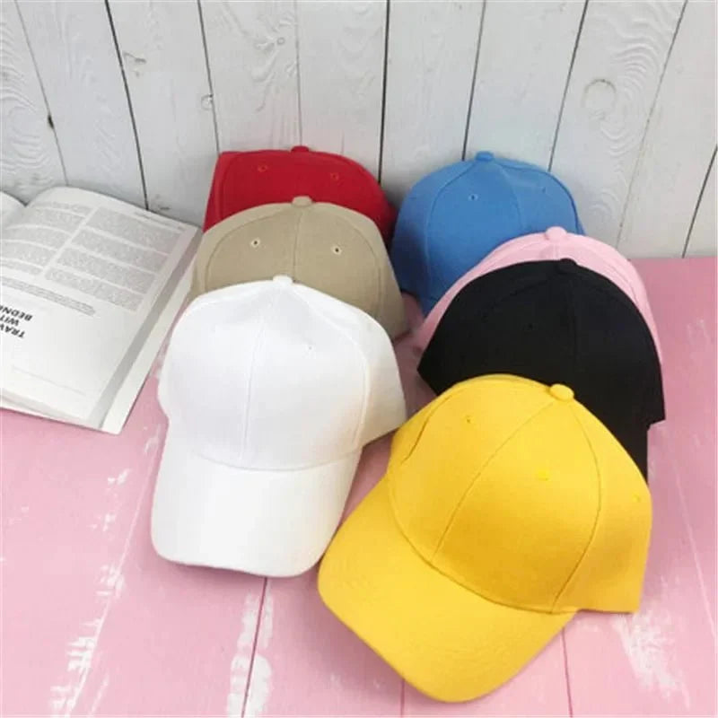 Unisex plain baseball cap by TrendLux Wear, adjustable structured hat in multiple colors, close-up view showing fabric and fit