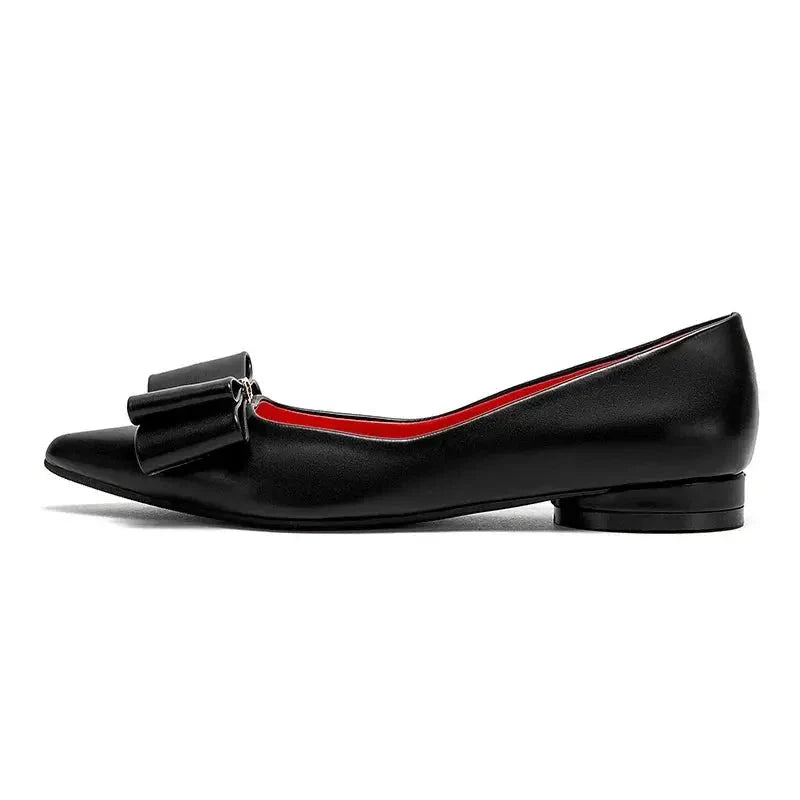 Women's pointed-toe bow flat shoes by TrendLux Wear, stylish and comfortable footwear with elegant design and sleek silhouette.