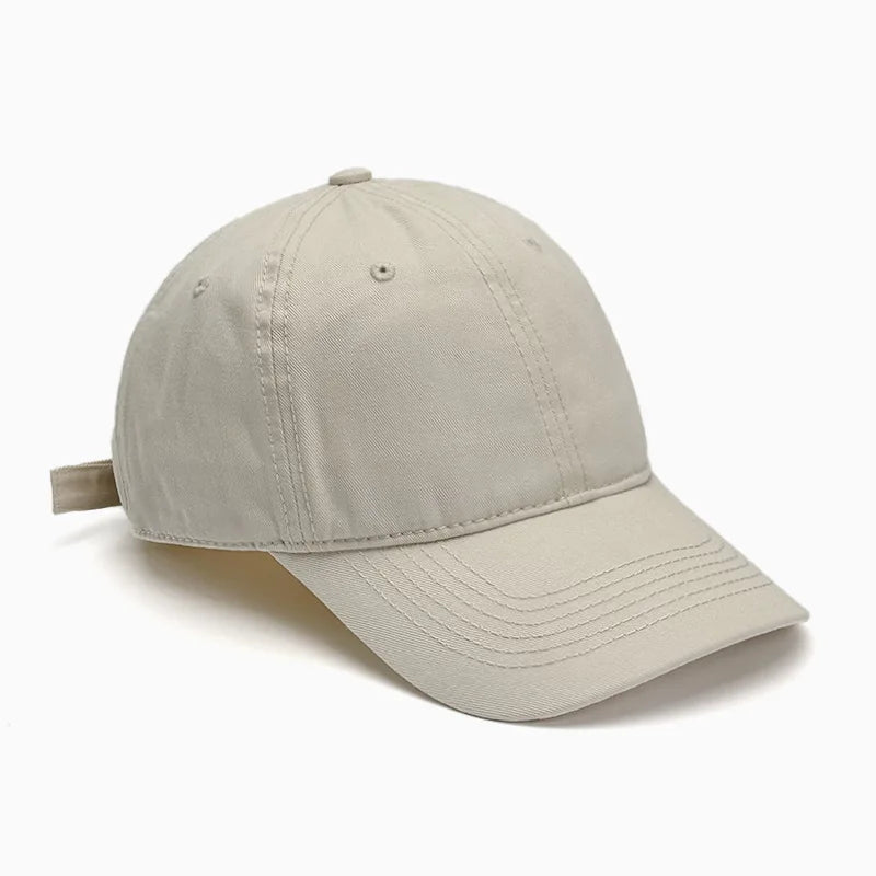 Unisex Soft-Top Dad Hat by TrendLux Wear, plain baseball cap with sun protection, available in 21 colors, shown in black.