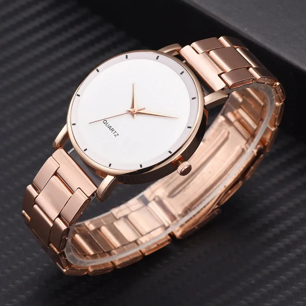 Women's rose gold stainless steel watch by TrendLux Wear featuring a sleek design and a round dial with minimalist details.