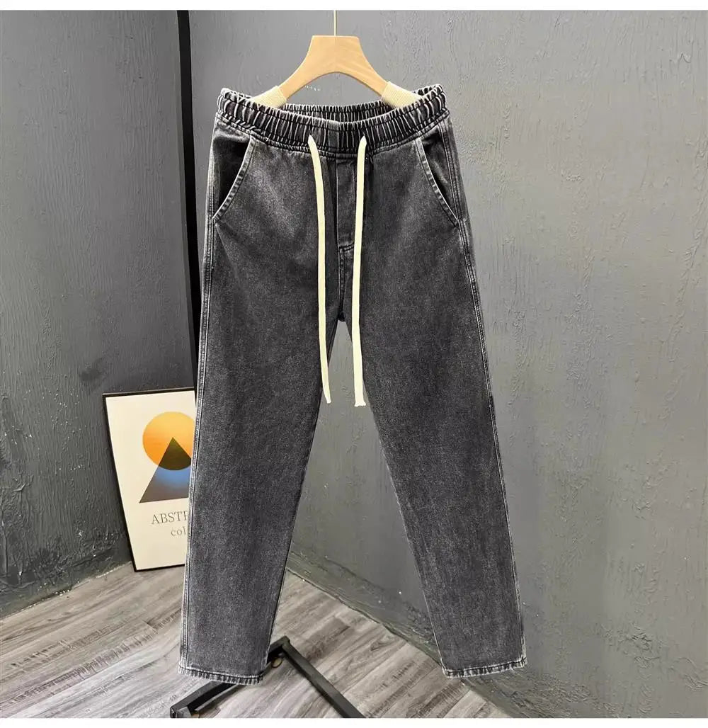 Men's vintage loose straight leg jeans by TrendLux Wear, made of durable cotton denim, suitable for casual spring and autumn wear.