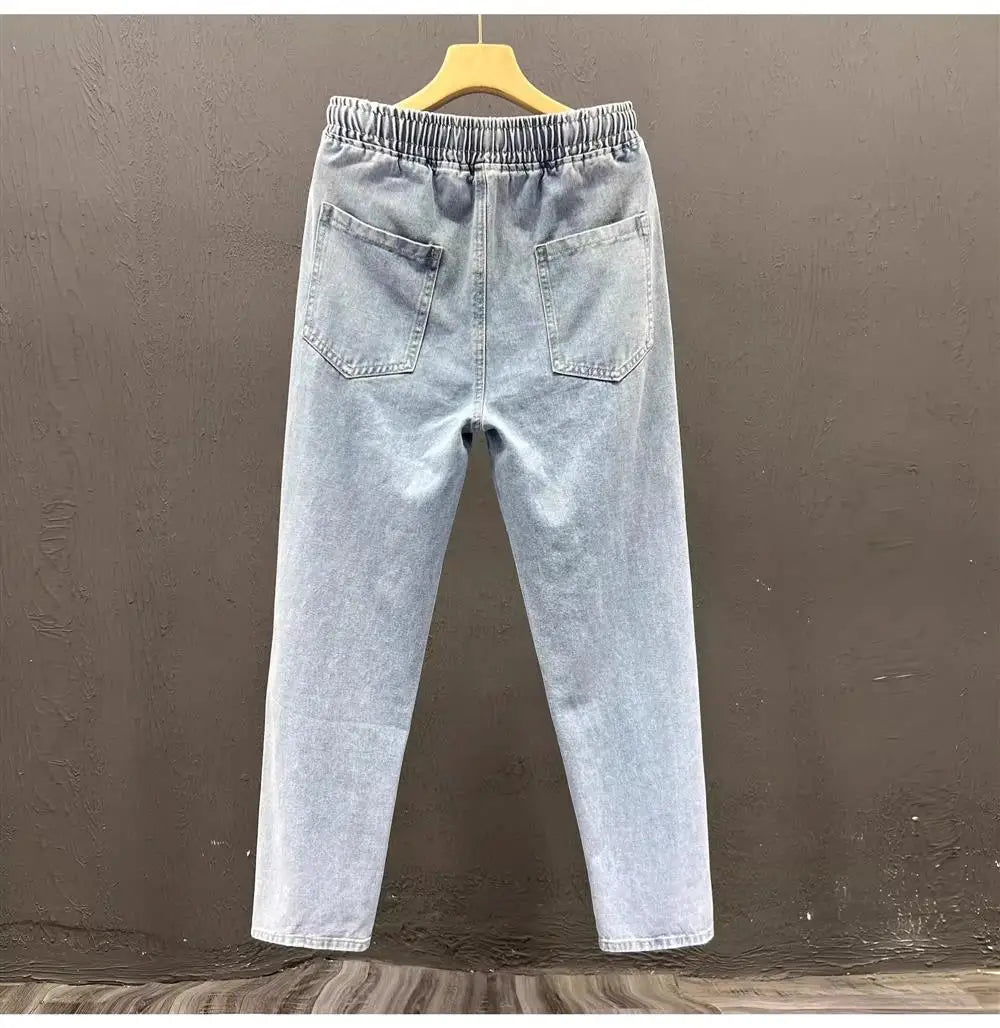 Men's vintage loose straight leg jeans from TrendLux Wear, made of durable cotton denim, perfect for casual spring and autumn wear.