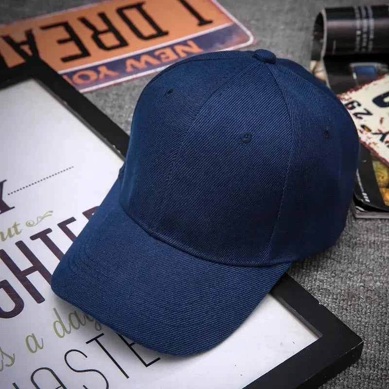 Unisex plain baseball cap by TrendLux Wear, adjustable structured hat available in 24 colors, featuring a classic design.