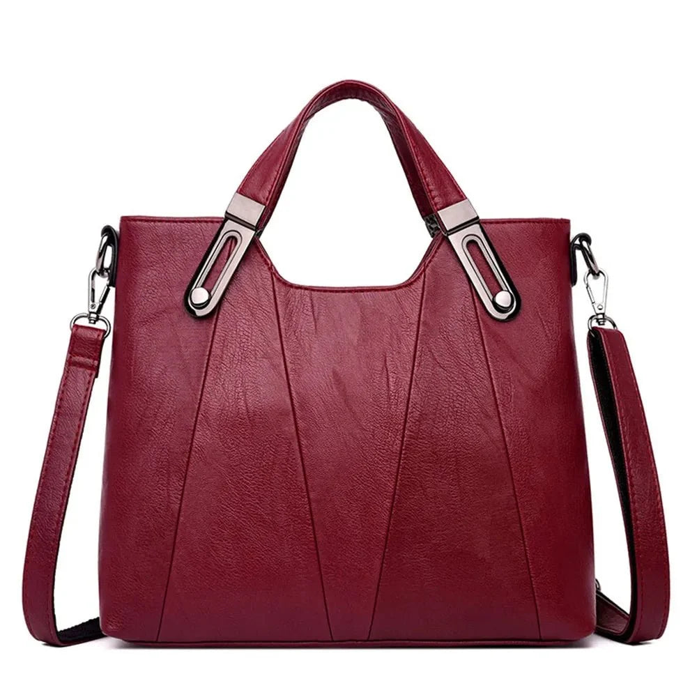 Women's luxury pure leather handbag with multiple pockets from TrendLux Wear, featuring a stylish design and spacious interior.
