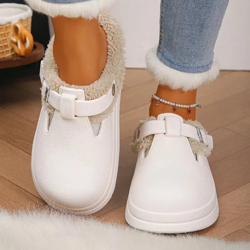 Women's waterproof furry mule slippers by TrendLux Wear featuring plush lining, EVA sole, non-slip design, and metal buckle detail.