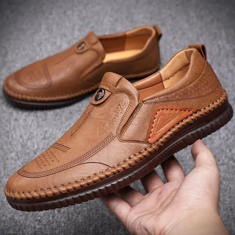 Men's genuine leather slip-on loafer sneakers from TrendLux Wear featuring a breathable soft sole and casual moccasin design.
