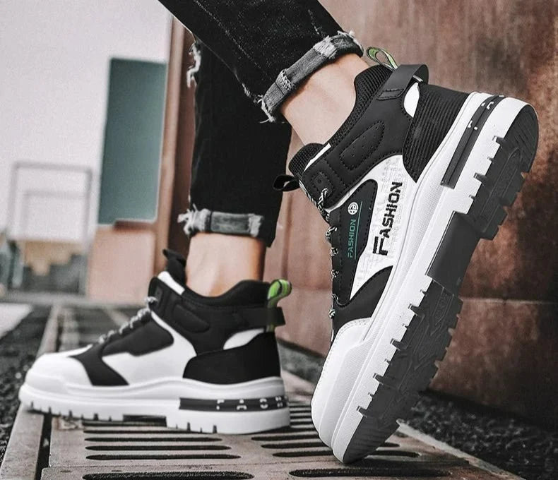 Men's high-top street sneakers by TrendLux Wear featuring non-slip vulcanized soles and ankle support, shown in black.
