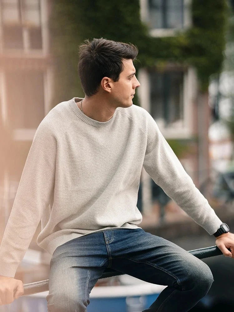 Men's oversized waffle-knit crewneck sweater in Heather Denim Blue from TrendLux Wear, casual pullover with textured knit fabric.