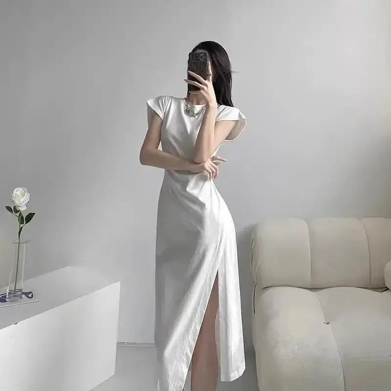 Y2K asymmetrical hem midi dress by The Glow Sanctuary featuring a stylish streetwear-inspired design and modern silhouette.