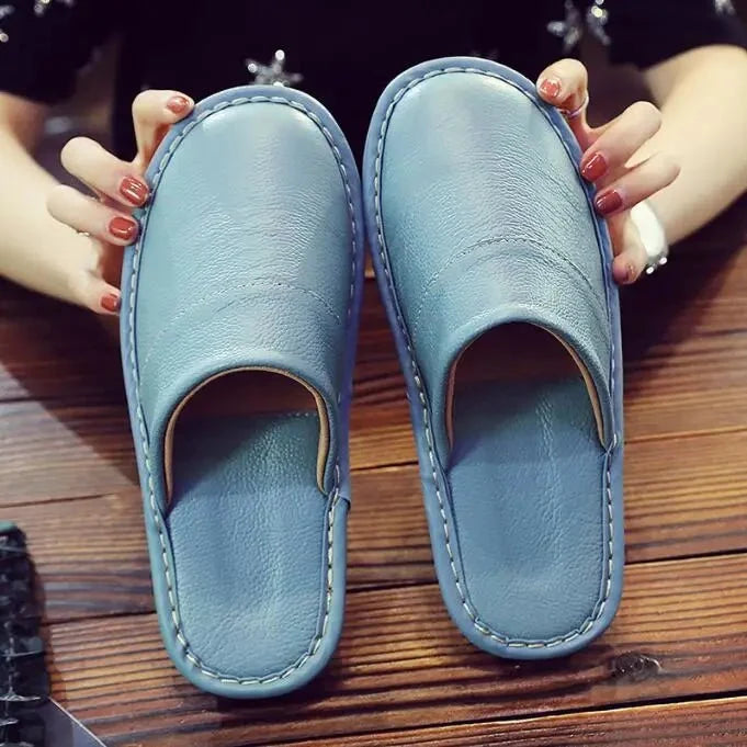 Unisex leather indoor slippers from TrendLux Wear with non-slip soles, available in EU sizes 35–46, featuring a comfortable slide design.
