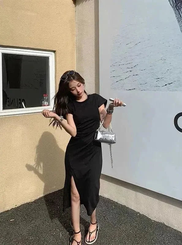 Y2K asymmetrical hem midi dress by The Glow Sanctuary featuring a stylish streetwear look with bold lines and a fitted silhouette.