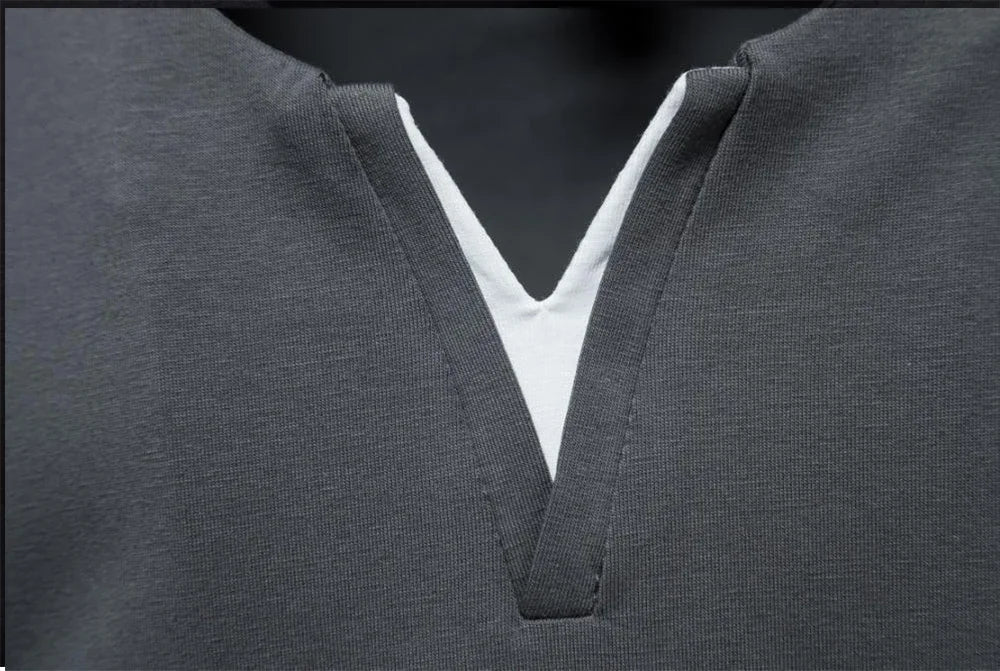 Men's slim fit Henley T-shirt by TrendLux Wear in black, white, or grey, featuring moisture-wicking, breathable fabric.