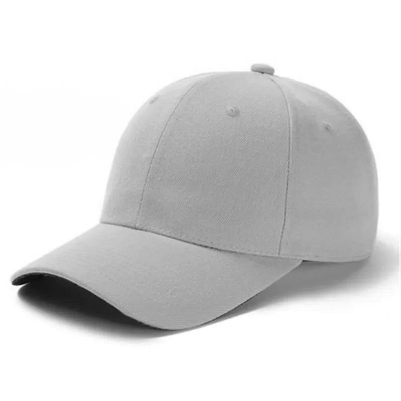 Unisex plain baseball cap by TrendLux Wear, adjustable structured hat in black with a curved brim and ventilation eyelets.