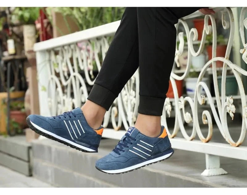 Men's luxury suede running sneakers by TrendLux Wear featuring breathable design and anti-odor sport shoes for active wear.