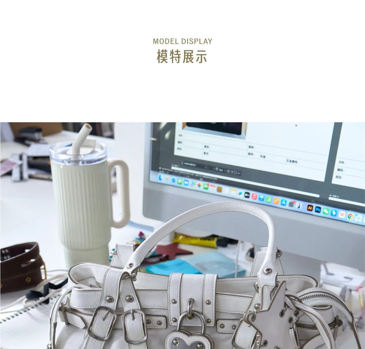 White faux leather handbag with rivet details and a single top handle, designed as a casual crossbody bag.