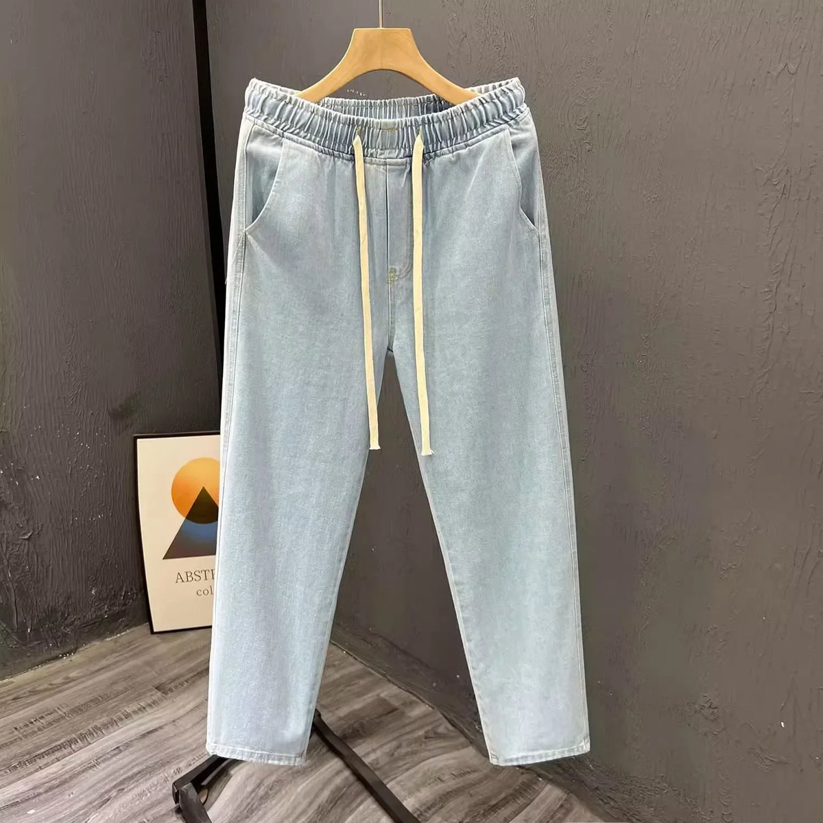 Men's vintage loose straight-leg jeans by TrendLux Wear, made from durable cotton denim, ideal for spring and autumn casual wear.