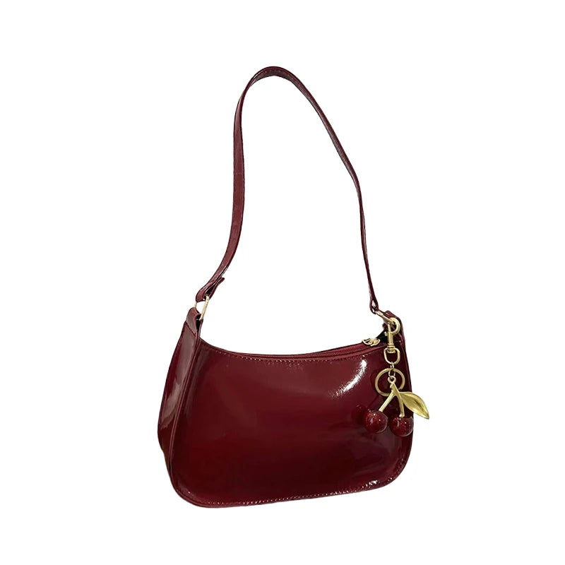 TrenLux Wear Women's Pure Leather Solid Colour Cherry Pendant  Bag TrenLux Wear