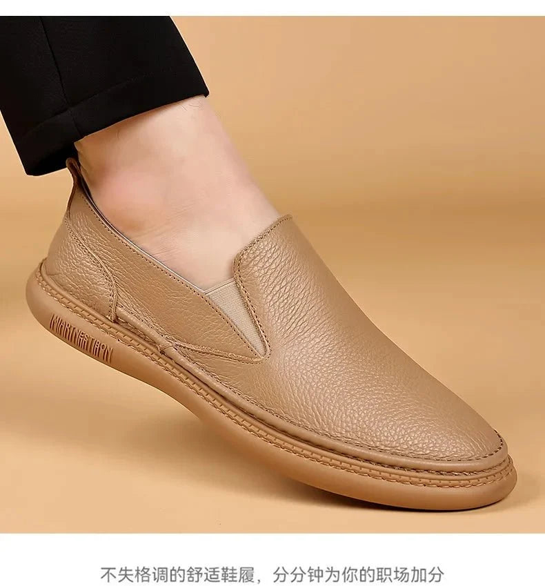 Men's brown genuine leather casual loafers by TrendLux Wear, slip-on flat shoes with breathable solid color design.