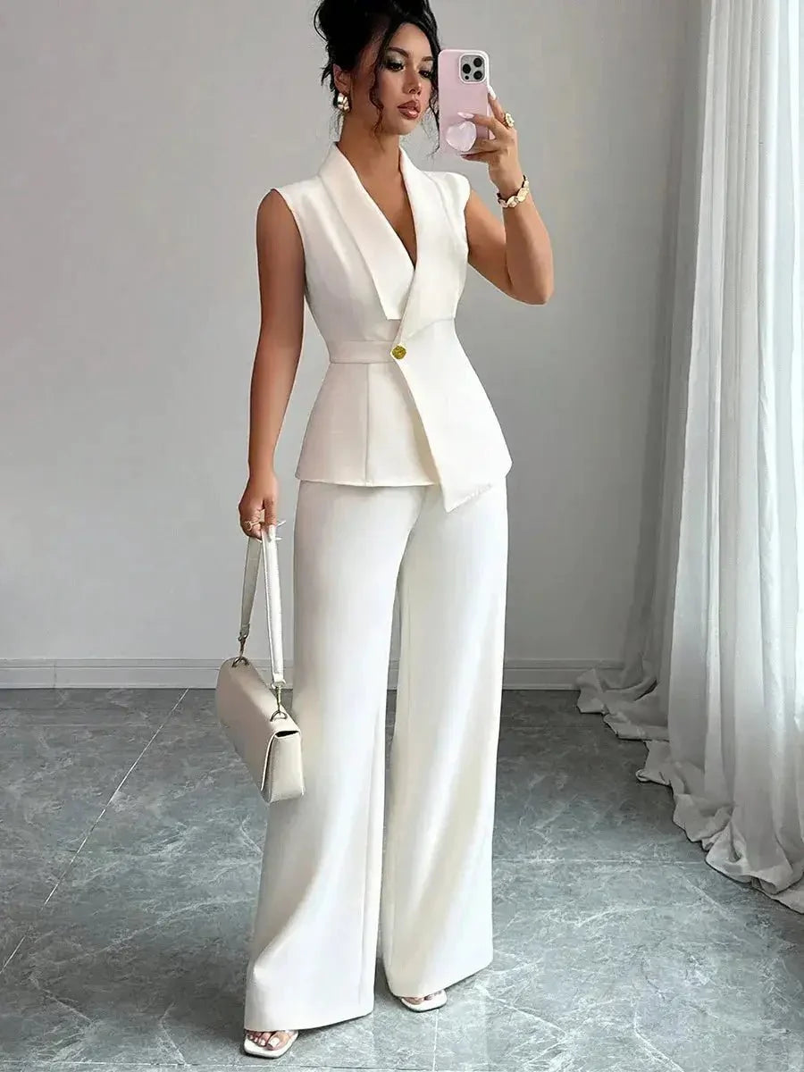 Women's spring sleeveless 2-piece suit by TrendLux Wear, featuring a stylish top and matching pants in a lightweight fabric.