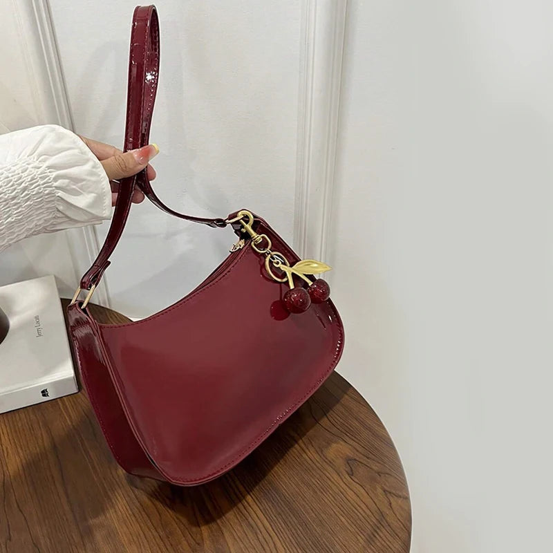 TrenLux Wear Women's Pure Leather Solid Colour Cherry Pendant  Bag TrenLux Wear