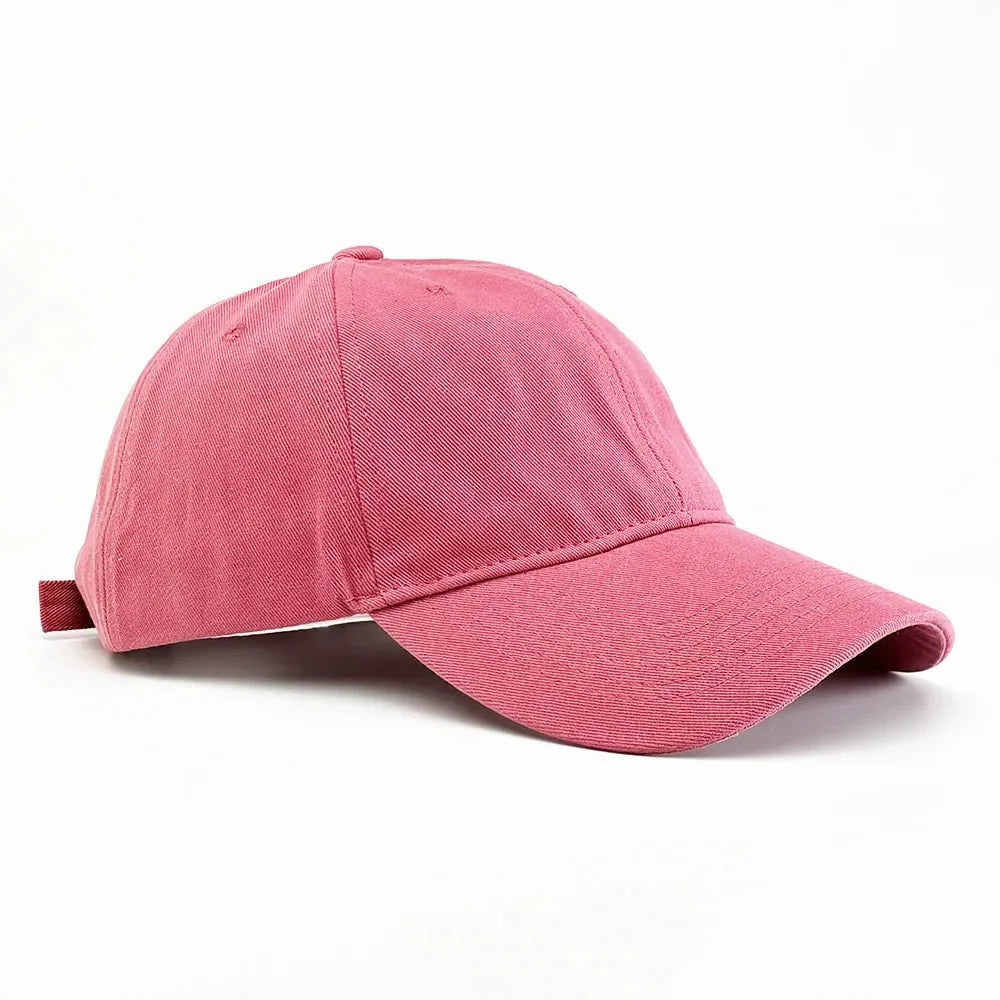Unisex Korean style cotton curved brim baseball cap by TrendLux Wear in black with soft top and adjustable strap.