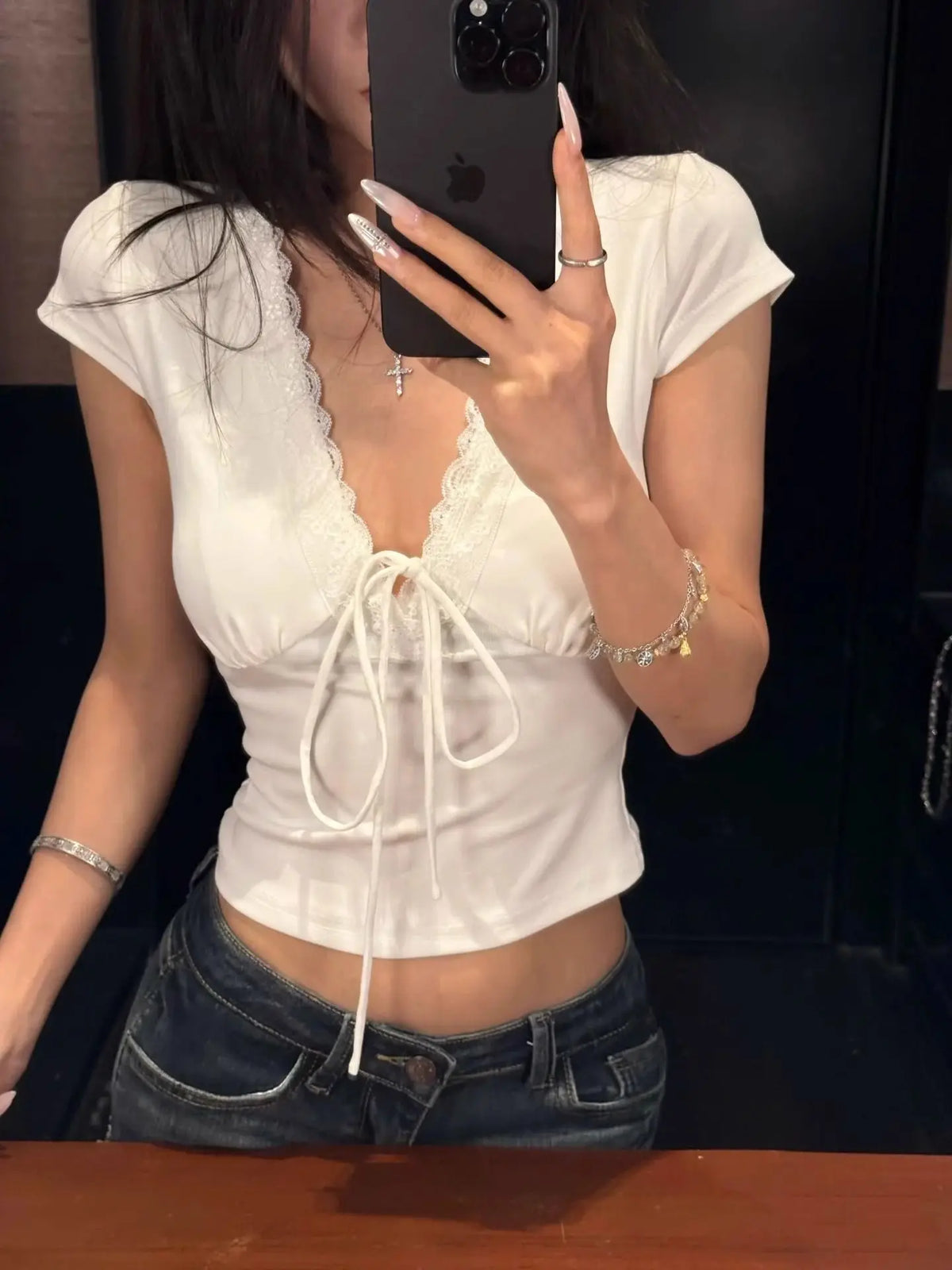 Women’s satin V-neck lace top by TrenLux Wear, short sleeves, slim fit, perfect for summer streetwear and casual outings.