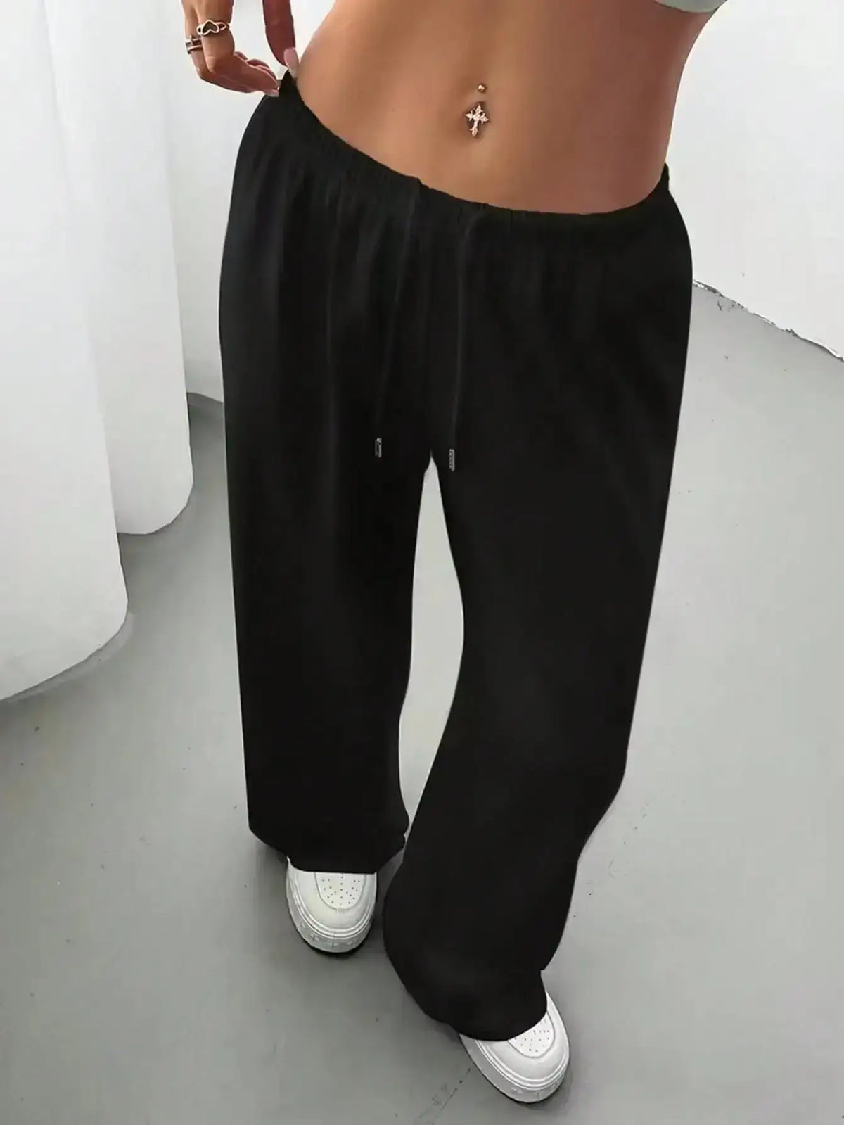 Ladies' casual wide-leg jogging pants by TrendLux Wear, shown in soft fabric with relaxed fit and comfortable waistband.
