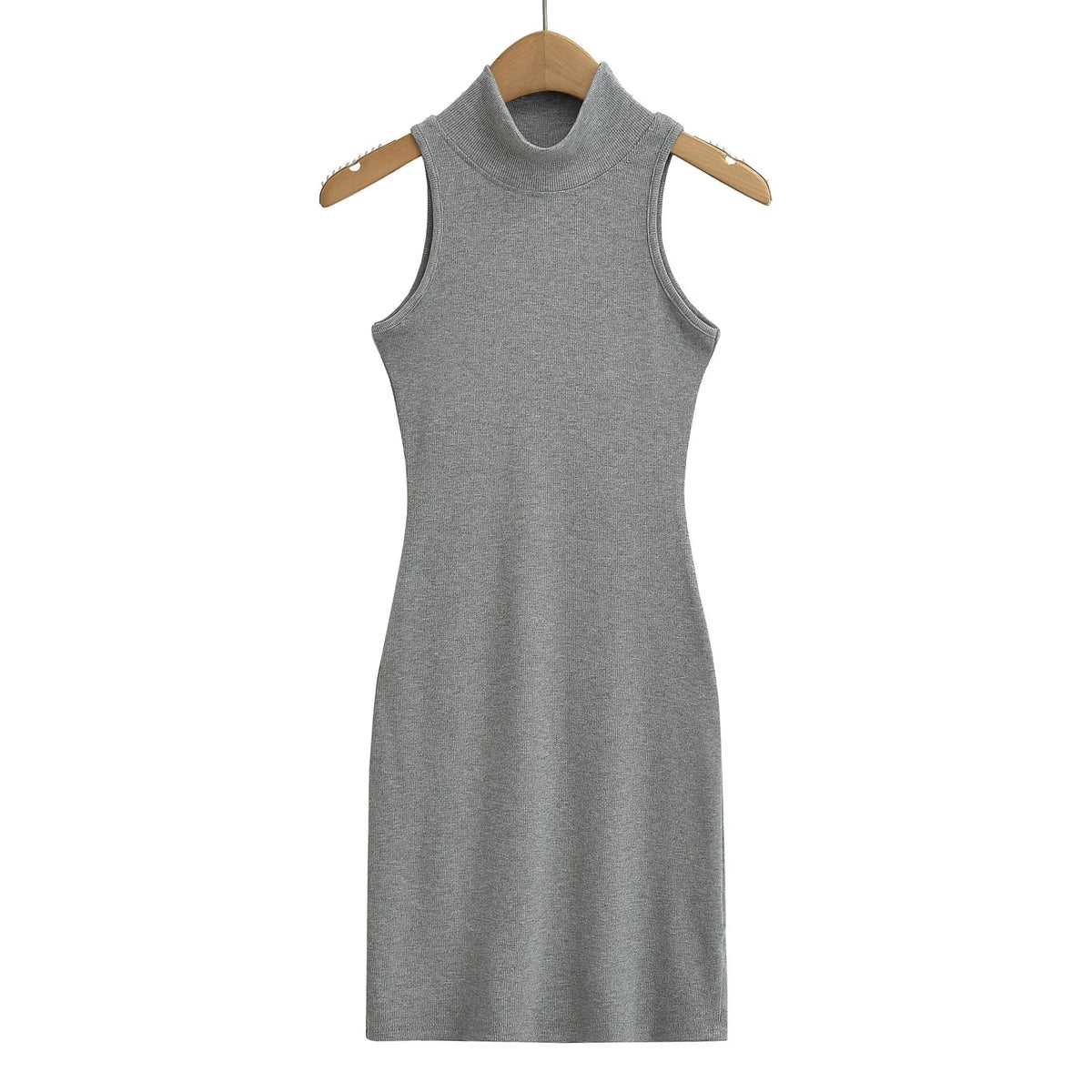 Women's knit turtleneck bodycon ankle-length maxi dress by The Glow Sanctuary, shown in a close-up of the fitted, ribbed fabric.