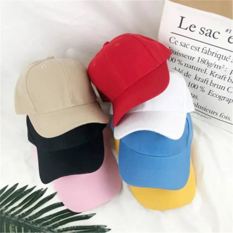 Unisex plain baseball cap by TrendLux Wear, adjustable structured hat in multiple colors, front panel and curved brim visible.