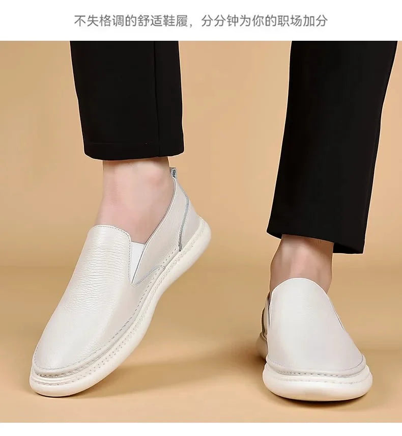 Men's genuine leather casual loafers by TrendLux Wear, breathable slip-on flat shoes in solid color with a sleek, comfortable design.