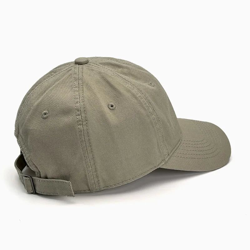 Unisex soft-top dad hat by TrendLux Wear featuring a plain baseball cap design with sun protection, available in 21 colors.