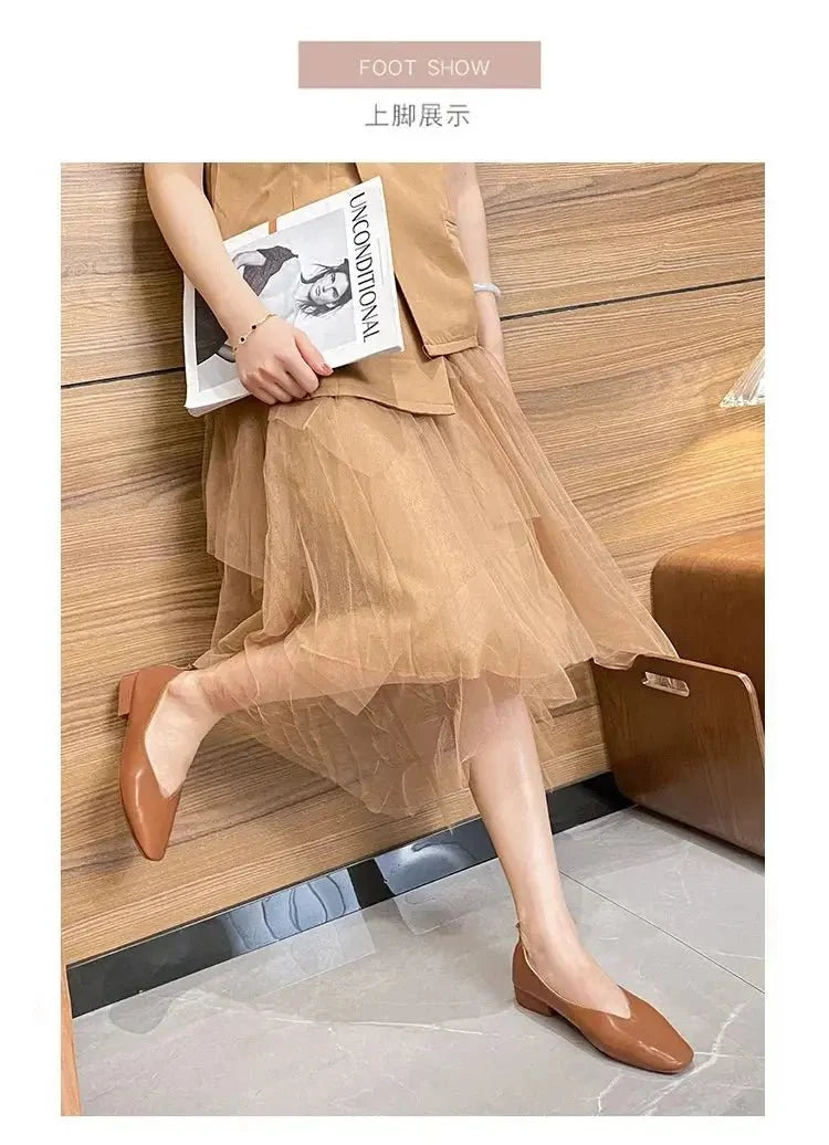 Women's round-toe leather loafer flats by TrendLux Wear, showcasing sleek design and comfortable slip-on shoes.