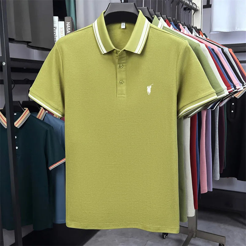 Solid olive green polo shirt featuring short sleeves, a classic collar, and embroidered pony logo, displayed on a hanger.