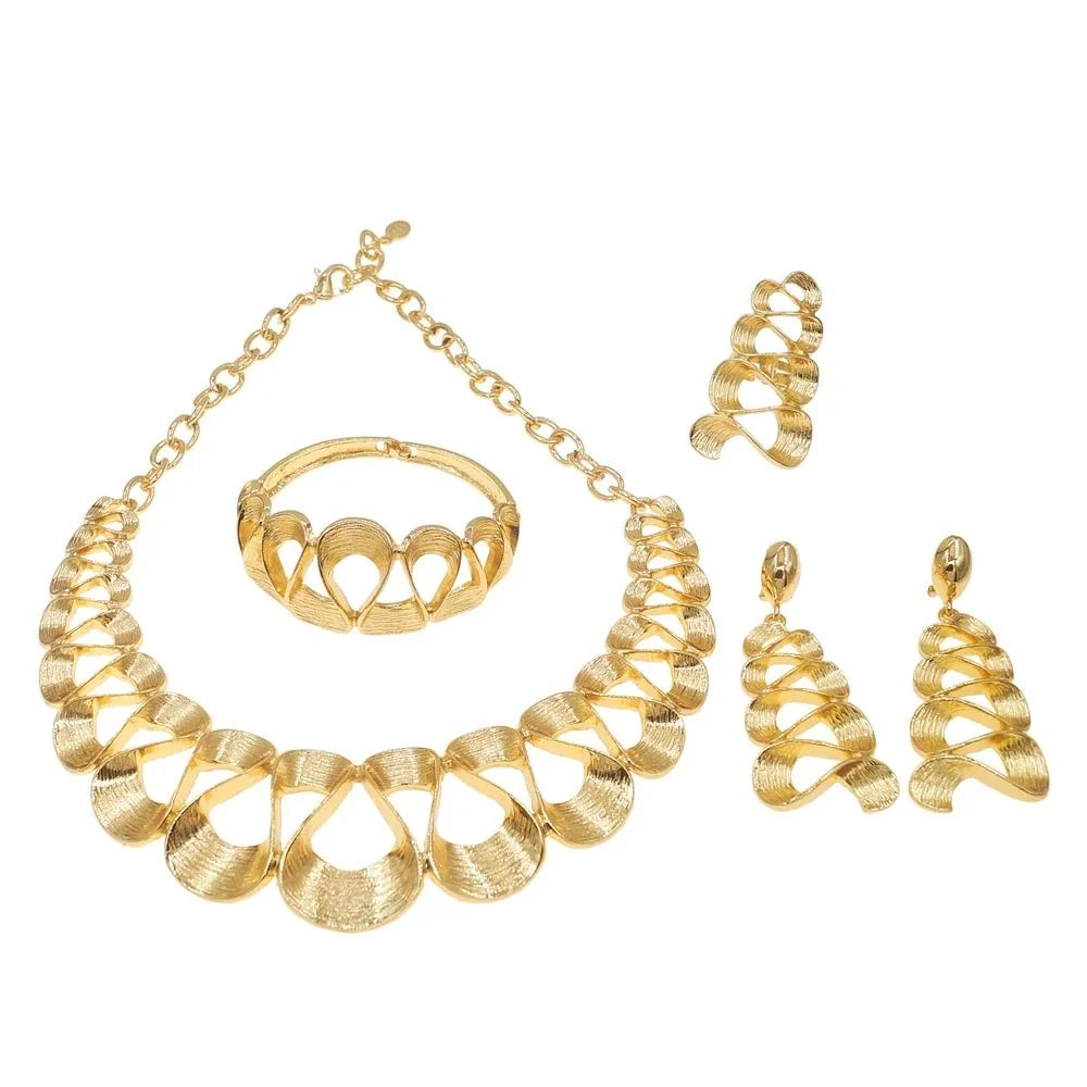 Gold plated women's jewelry set with wavy pendant necklace and matching earrings, stylish TrendLux Wear accessories.