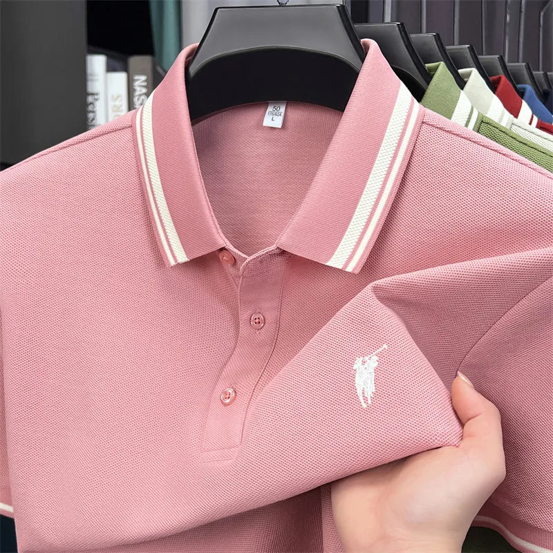 Pink short sleeve polo shirt for men with white striped collar and embroidered pony logo, made from breathable cotton.