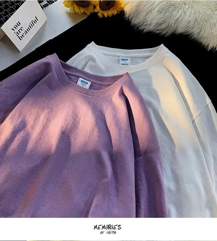 Unisex oversized long sleeve blank T-shirt by My Store 5, in black, displayed flat with sleeves spread, showcasing its relaxed fit.