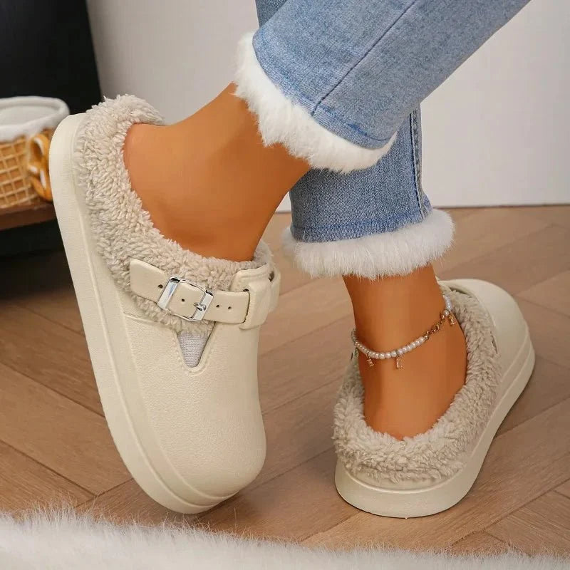 Women's waterproof furry mule slippers with plush lining, EVA sole, non-slip design, and metal buckle from TrendLux Wear.