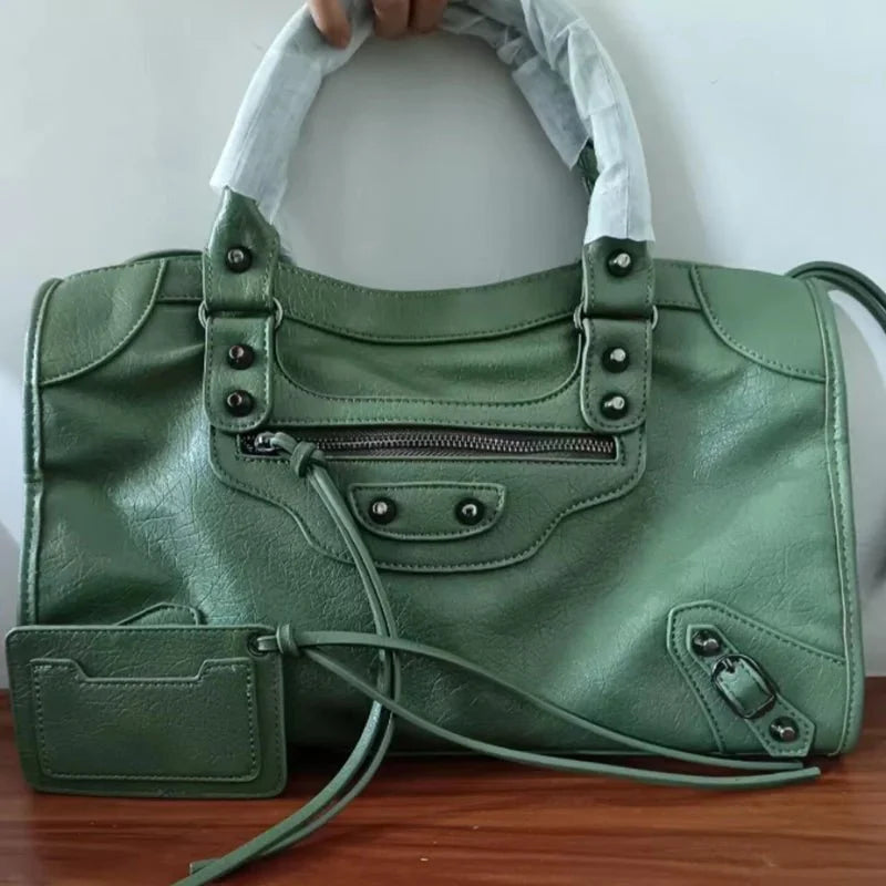 Women's luxury motorcycle hobo handbag by TrendLux Wear, high-capacity leather tote with stylish design and sturdy handles.