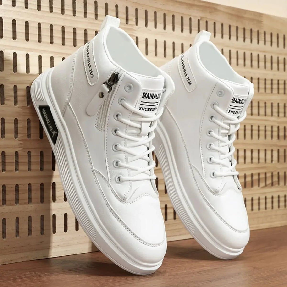 Men's high-top sneakers by TrendLux Wear in white and black with breathable fabric, lace-up closure, and side zip detail.