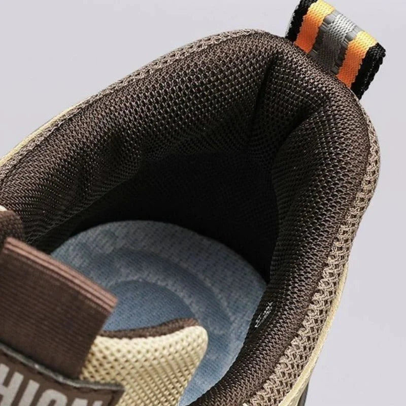 Men's high-top street sneakers by TrendLux Wear featuring non-slip vulcanized rubber soles and stylish ankle design.