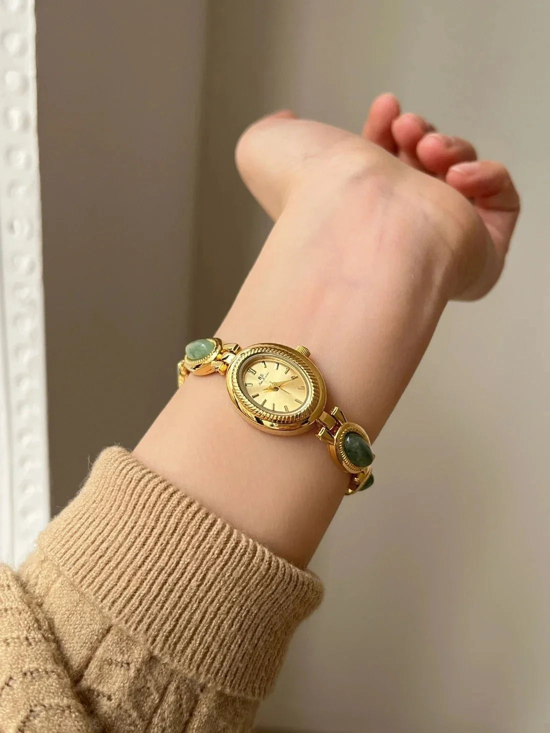 Women's luxury jade green quartz wristwatch with jewelry bracelet design by TrendLux Wear, featuring a stylish dress watch appearance.