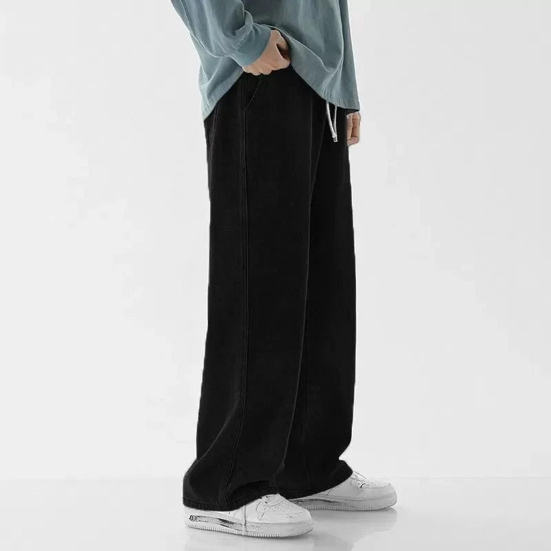 Men's vintage loose straight leg jeans from TrendLux Wear in durable cotton denim, ideal for casual spring and autumn wear.