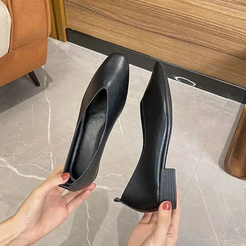 Women’s round-toe leather loafer flats by TrendLux Wear, featuring a classic slip-on shoe with a smooth leather finish.