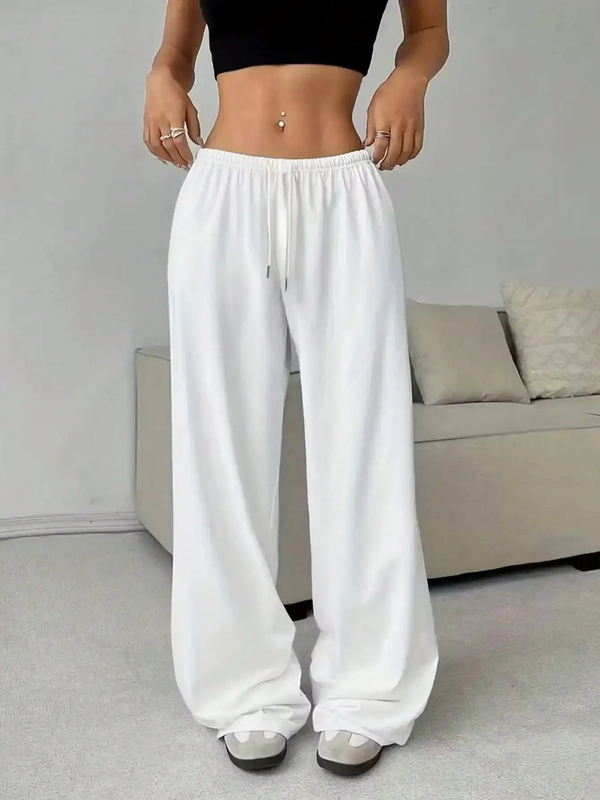Ladies' casual wide-leg jogging pants by TrendLux Wear, featuring a relaxed fit and comfortable fabric in a stylish design.
