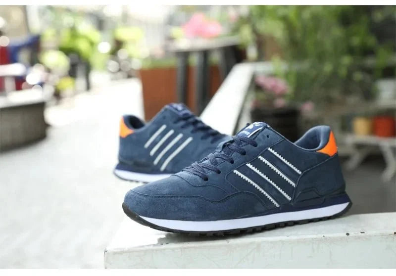 Men's luxury suede running sneakers by TrendLux Wear featuring breathable, anti-odor sport shoes with stylish design and comfort.
