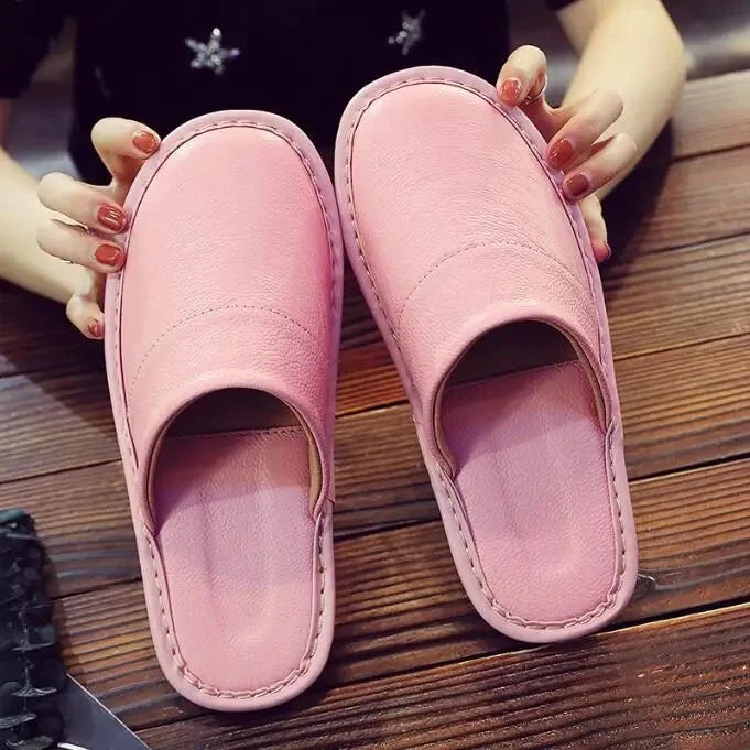 Unisex leather indoor slippers with non-slip soles, available in EU sizes 35-46, from TrendLux Wear, ideal for comfortable home wear.