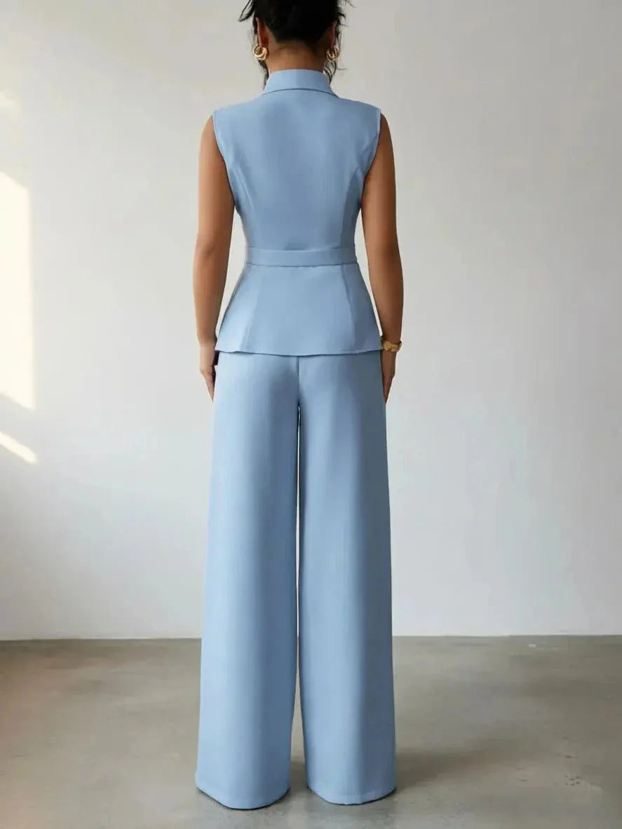 Women's spring sleeveless 2-piece suit by TrendLux Wear, featuring a stylish top and matching bottoms in a vibrant design.