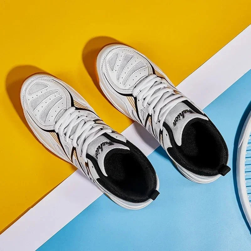 Unisex breathable court sneakers by TrendLux Wear, athletic shoes for tennis and volleyball, in sizes 35 to 50, shown from side view.