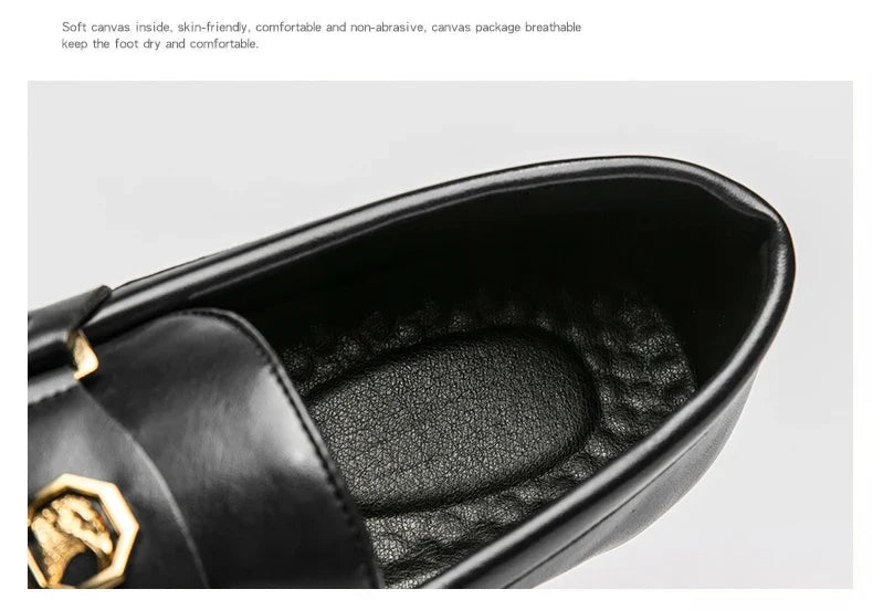 Black leather slip-on loafers featuring a metal buckle, with a cushioned and textured insole for comfort.